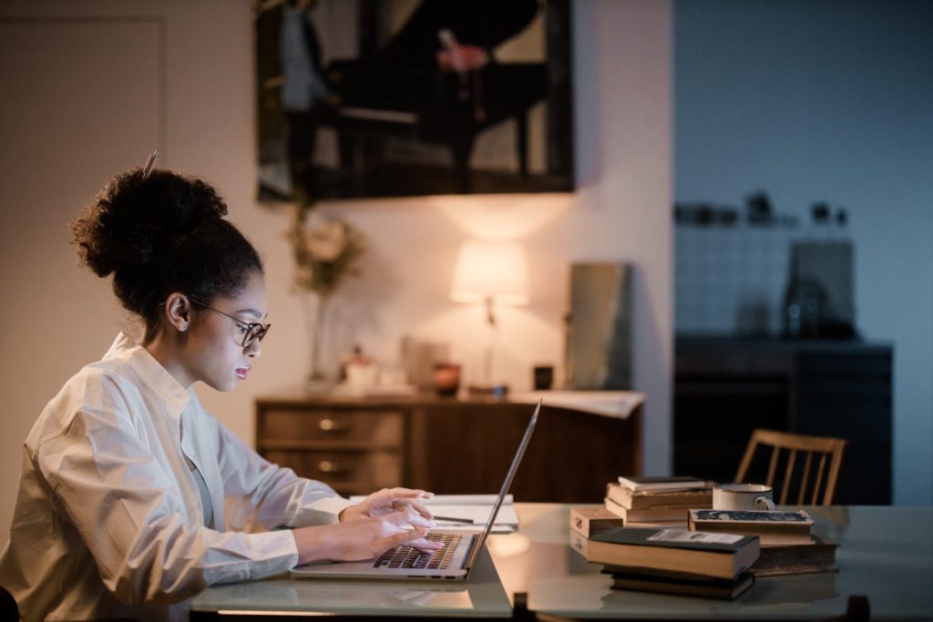 A Young Woman Working wit a Laptop