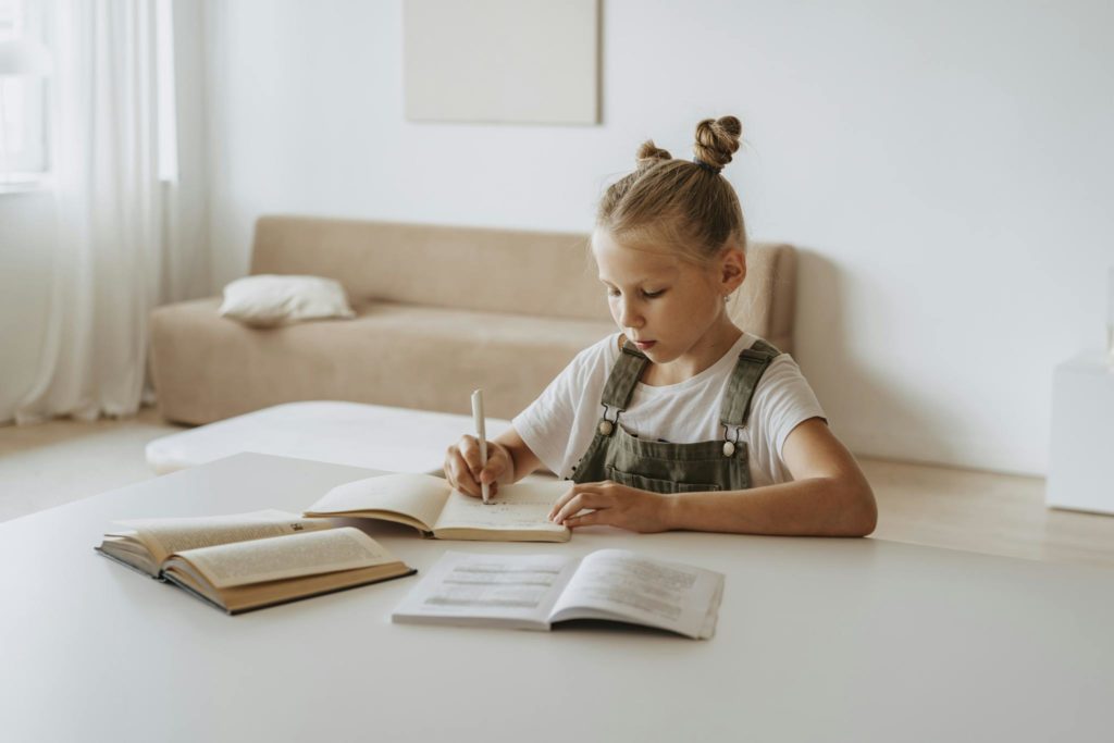 Little Girl Doing her Homework