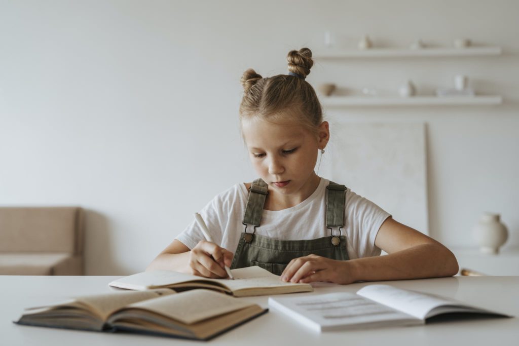 Little Girl Doing her Homework