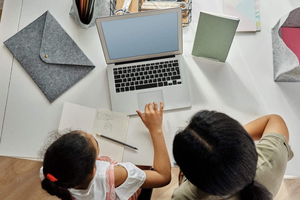 Mother Helping her Daughter with her Homework