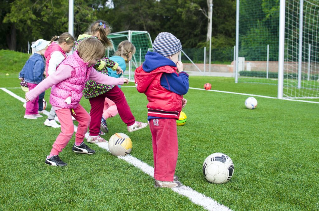 Toddler Playing Soccer